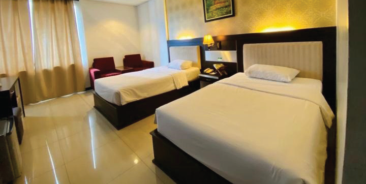 Deluxe Room, salah satu tipe kamar di Hotel Zahra Syariah Kendari yang menawarkan kenyamanan dengan harga terjangkau. (Dok Hotel Zahra Syariah Kendari)