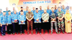 Sekda Buton Asnawi bersama Forkopimda saat FGD penyusunan naskah akademik rapersa Kabupaten Layak Anak.